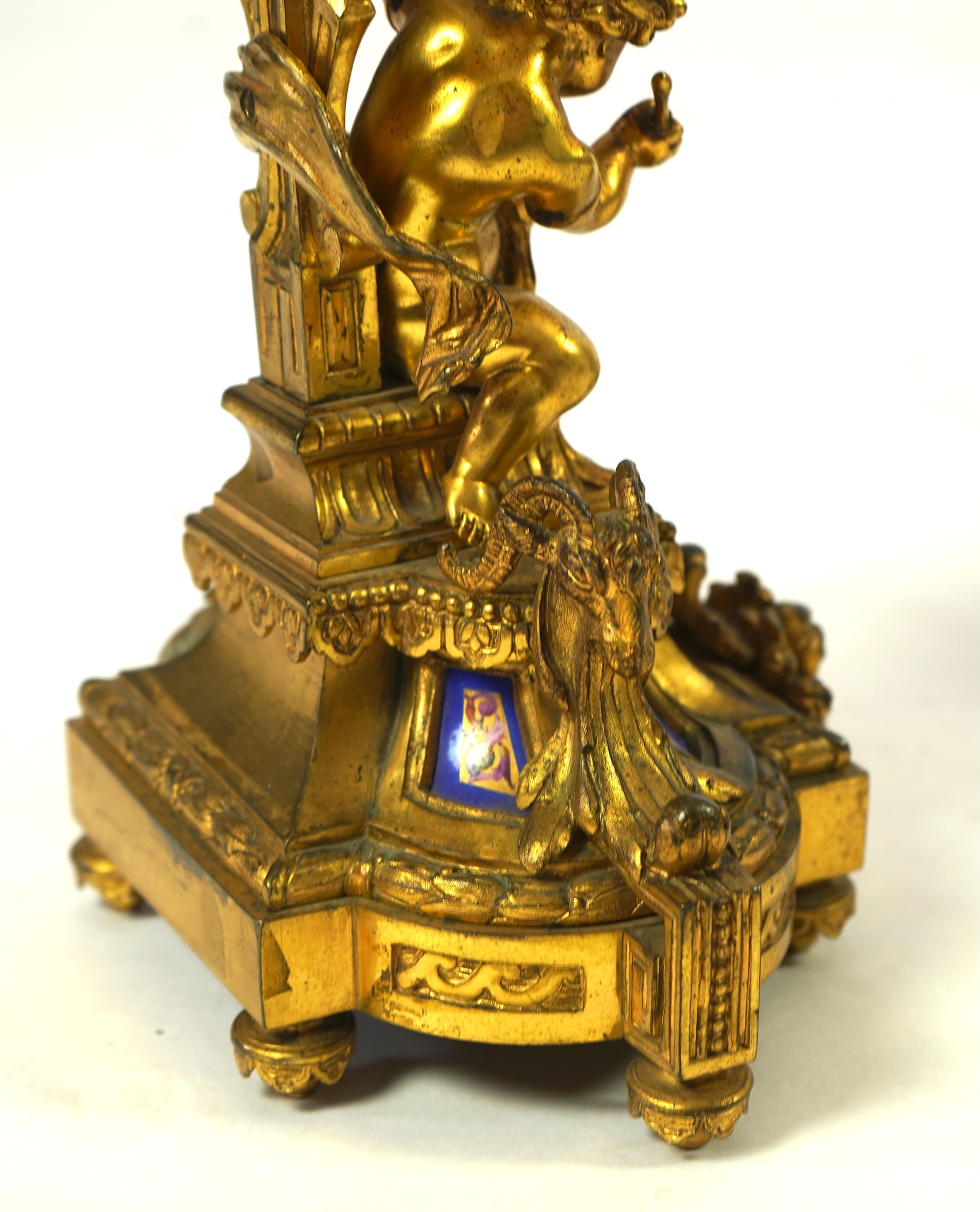 A pair of 19th century French Louis XVI style ormolu three light candelabra